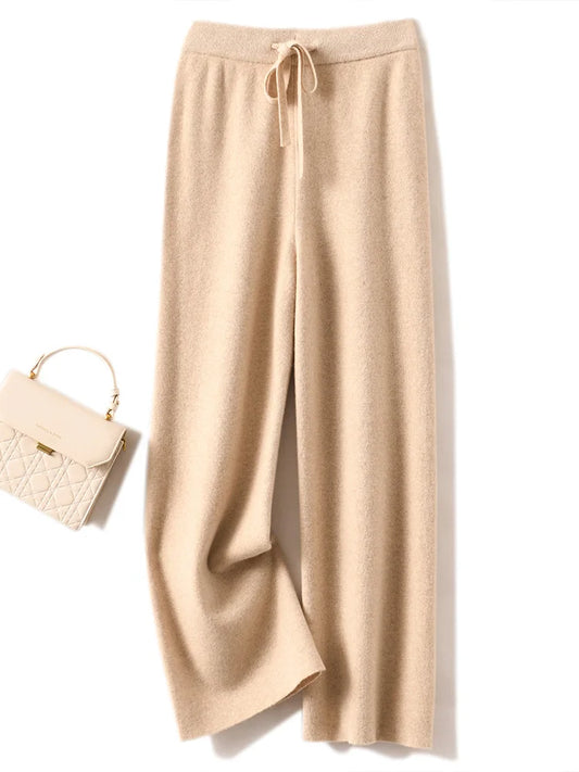 Wełniane spodnie wide-leg – swobodny krój z paskiem