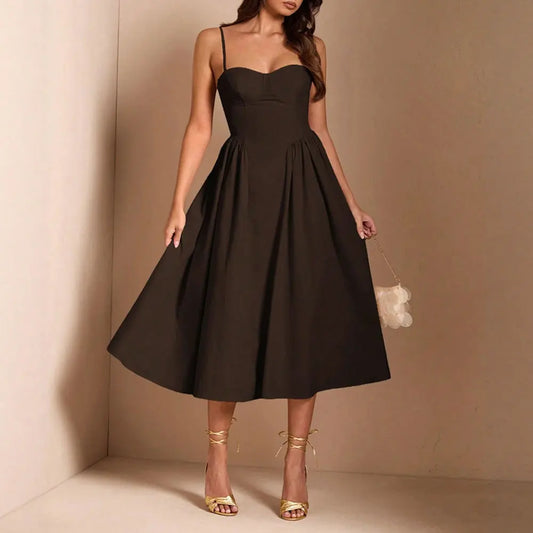 Sukienka midi bez rękawów – francuska elegancja